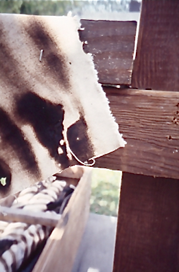 Closeup of cloth with burnt stripes