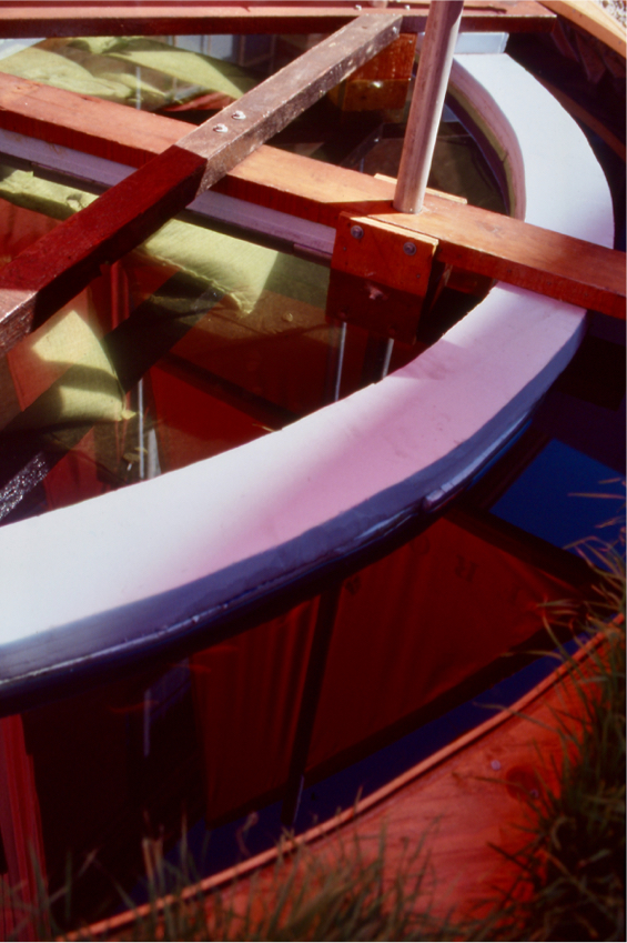 Detail: closeup of floating ring made of wood and foam inside the pool.