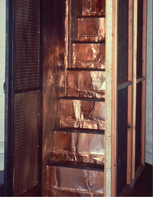 Interior shot: open door showing steep steps leading to top of tower.